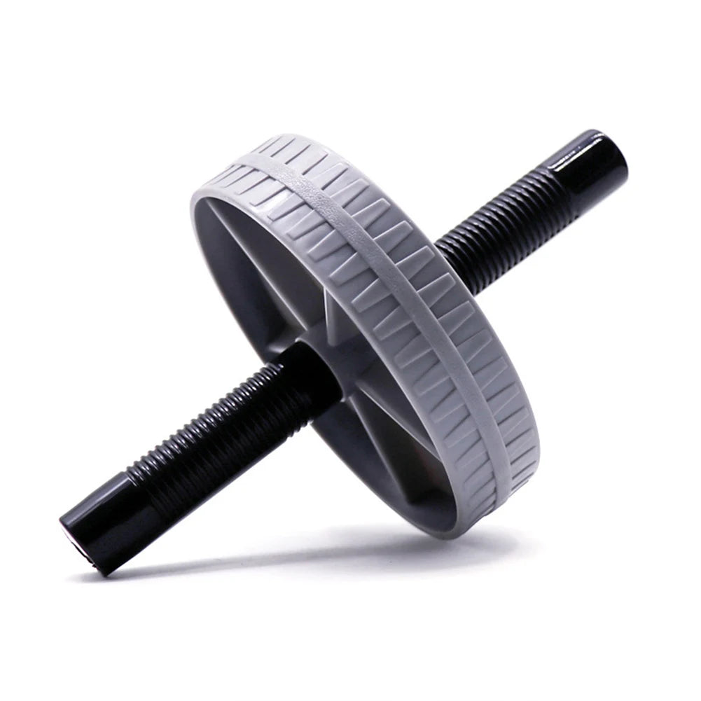 AB Roller Wheel Placed on the Floor for Core Strength Training and Home Workout