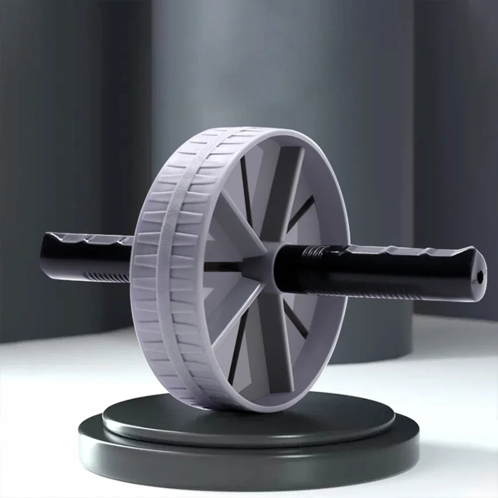AB Roller Wheel Placed on the Floor for Core Strength Training and Home Workout