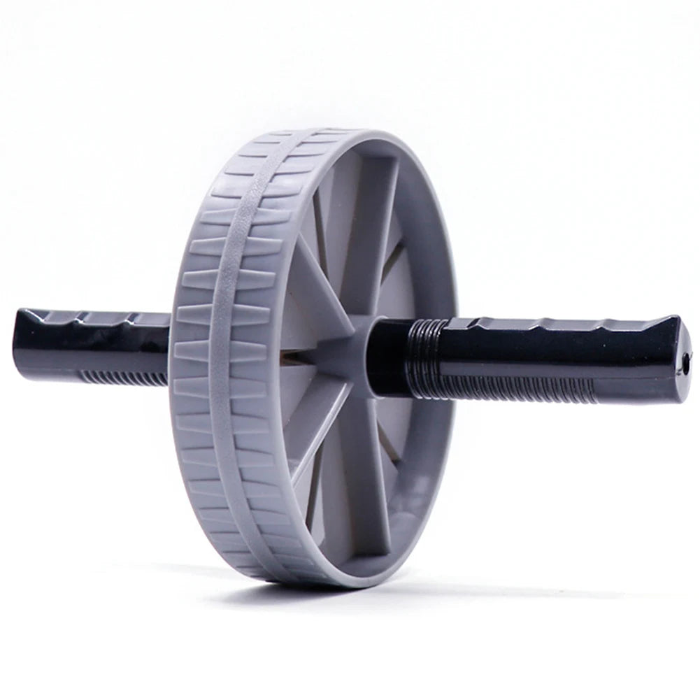 AB Roller Wheel Placed on the Floor for Core Strength Training and Home Workout