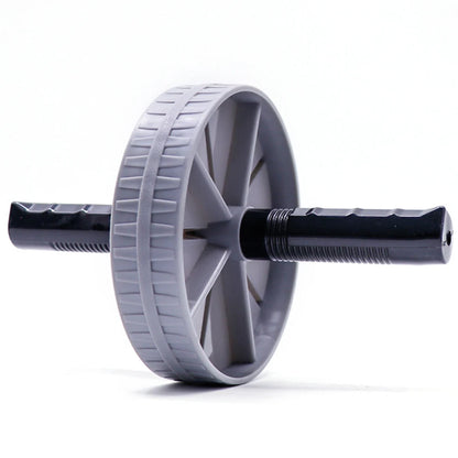 AB Roller Wheel Placed on the Floor for Core Strength Training and Home Workout